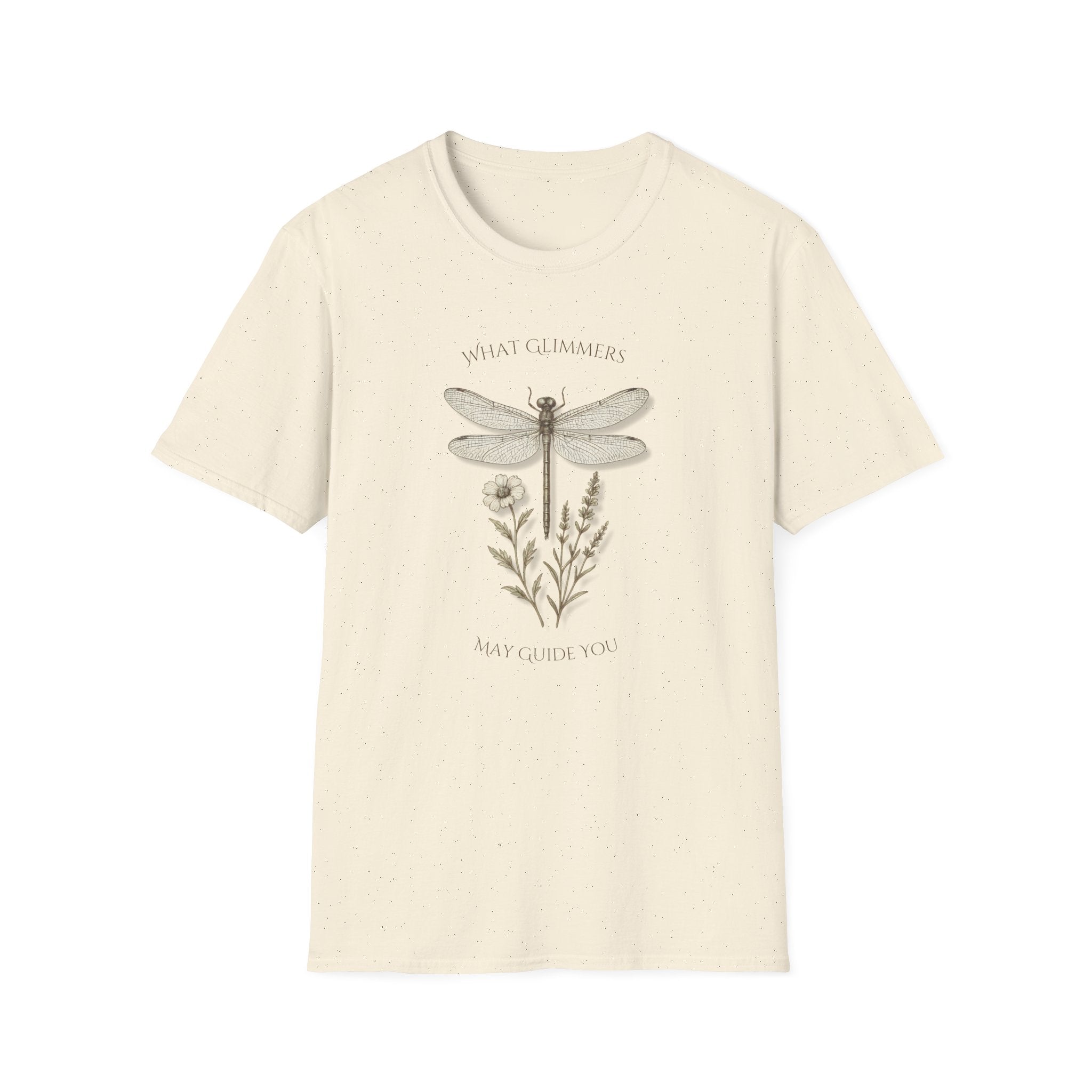 Beige t-shirt with dragonfly and floral design on a white background. "What Glimmers May Guide You" Dragonfly T-Shirt