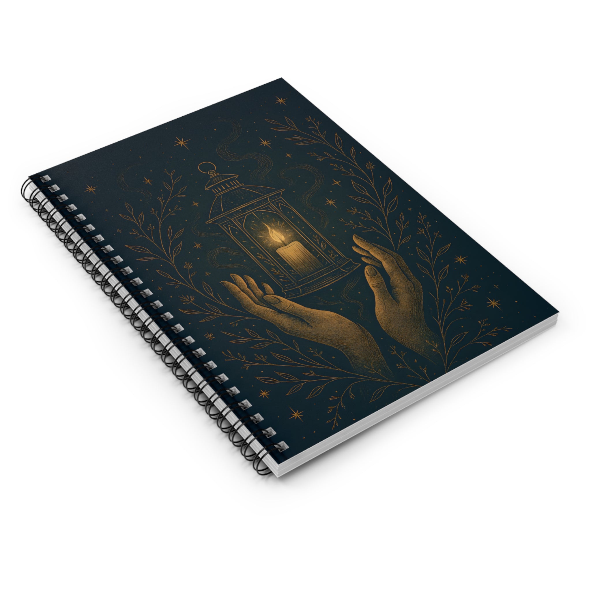 Notebook with a design of hands holding a lantern on a dark background