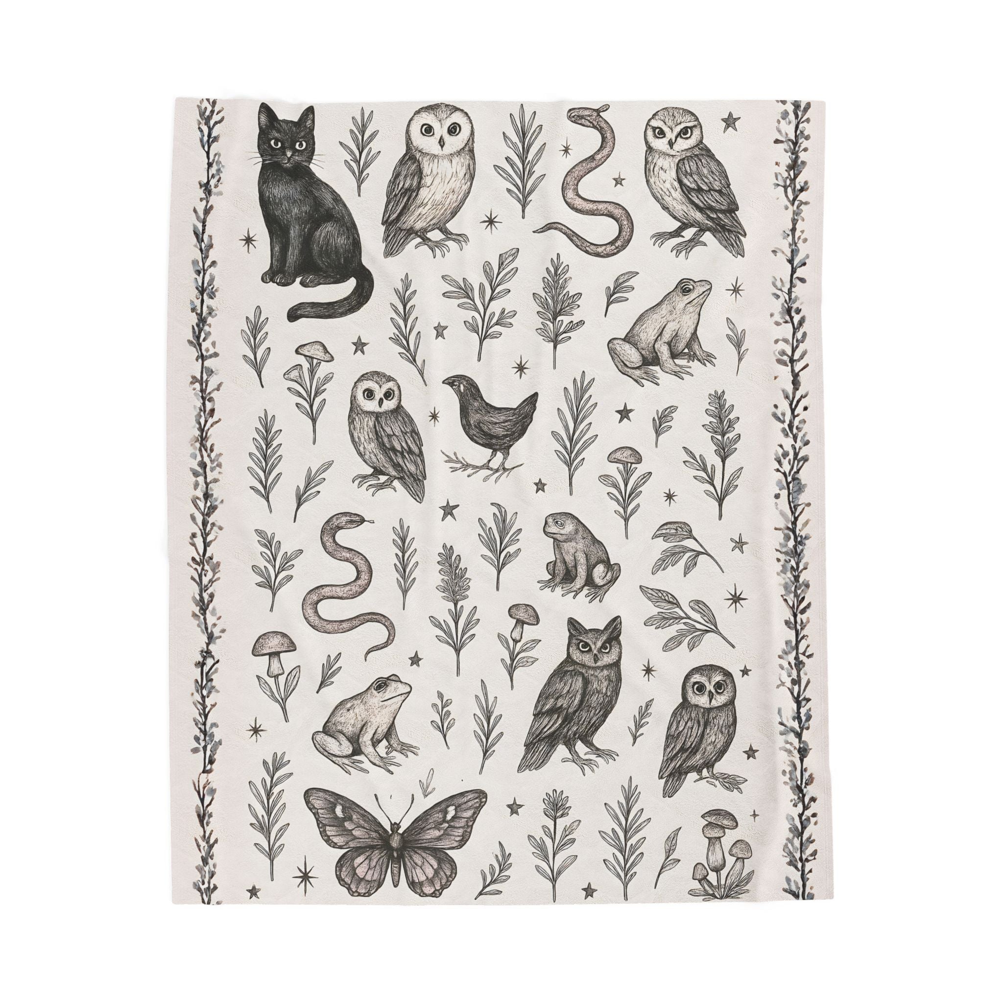 Patterned fabric with black and white illustrations of animals and plants on a light background