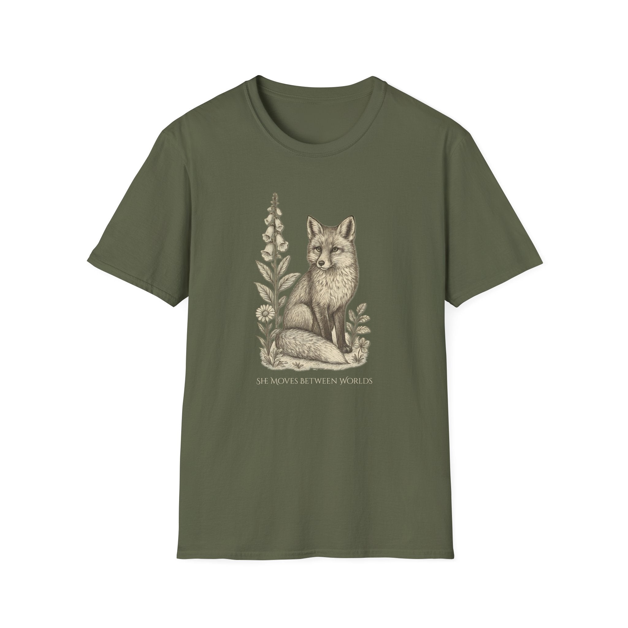 Green t-shirt with a fox and floral design on a white background. "She Moves Between Worlds" Fox T-Shirt